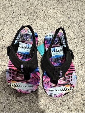 Reef Black-Strap Flip Flops with Pink & Blue Tropical Footbed